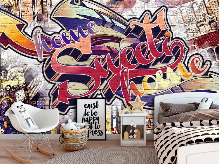 Fototapet Home sweet home - färgglada graffiti med text på tegel för tonåringar