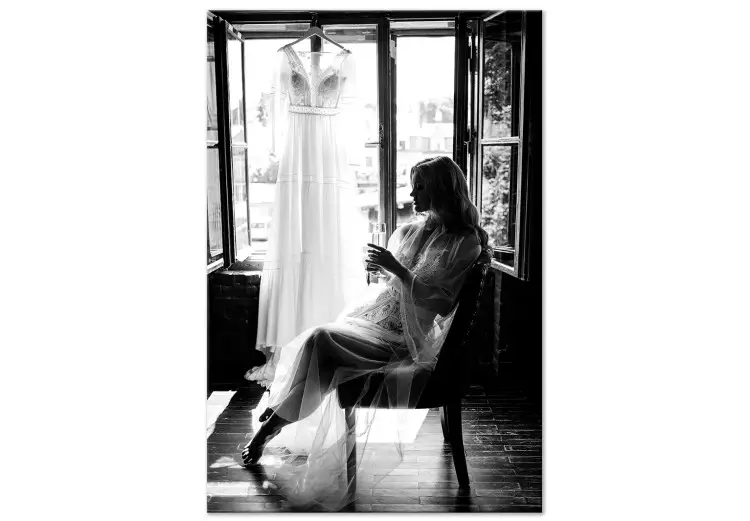 Kvinna och en brudklänning - svartvitt fotografi 