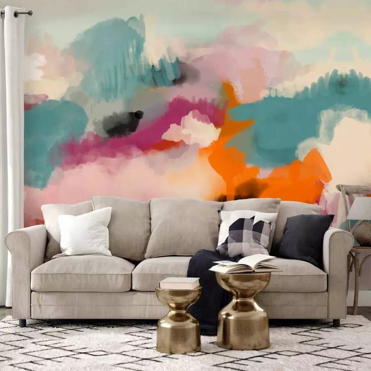 Färgglada abstraktioner - färgglada fläckar i form av moln på en blå bakgrund.