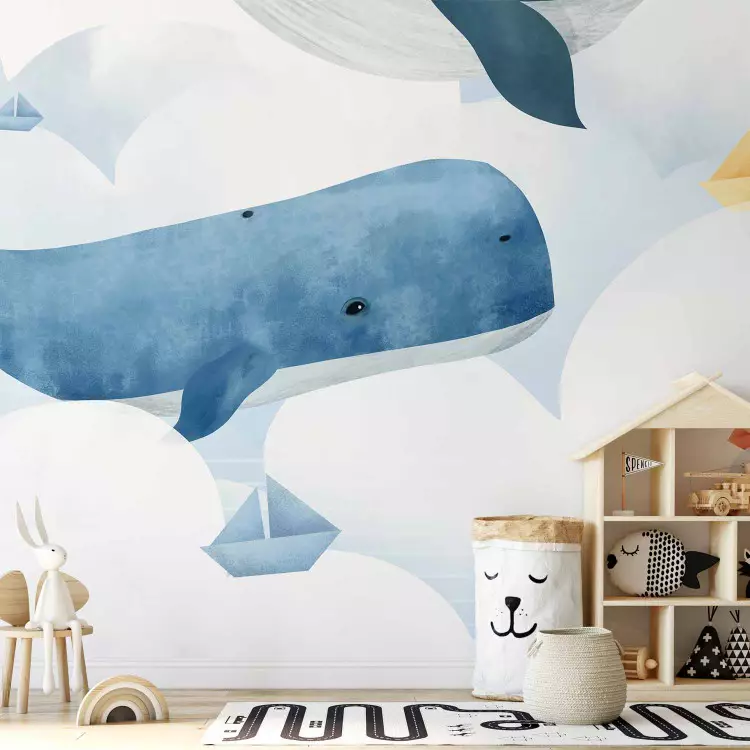 Valar simmar i molnen - färgglad illustration med fiskar och fartyg
