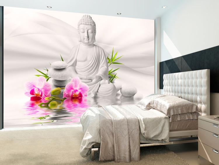 Fototapet Buddhism - mediterande Buddha på en vattenspegel och orkidéer på vit bakgrund