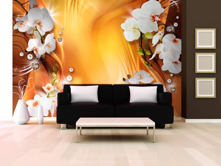 Fototapet Komposition med blommor - vita orkidéer på en apelsinfärgad bakgrund med mönster