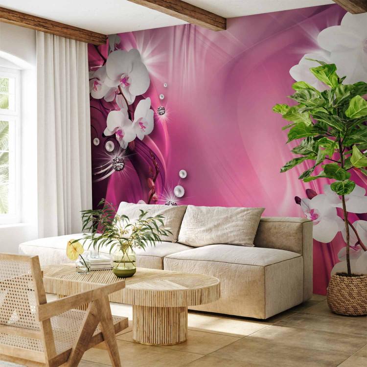 Fototapet Rosa komposition - vita orkidéer och pärlor på en rosa bakgrund med mönster