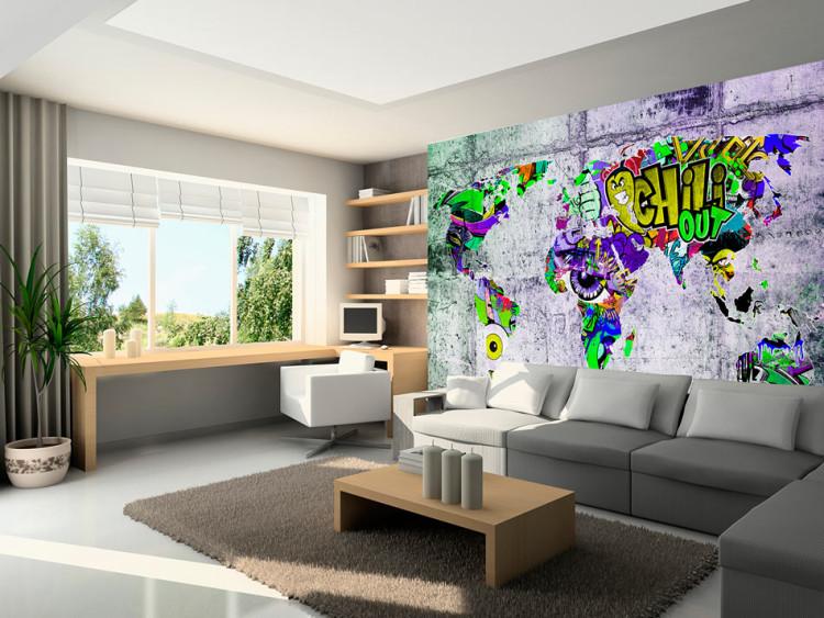 Fototapet Graffiti-världen - färgglad världskarta på betongbakgrund för tonåringar