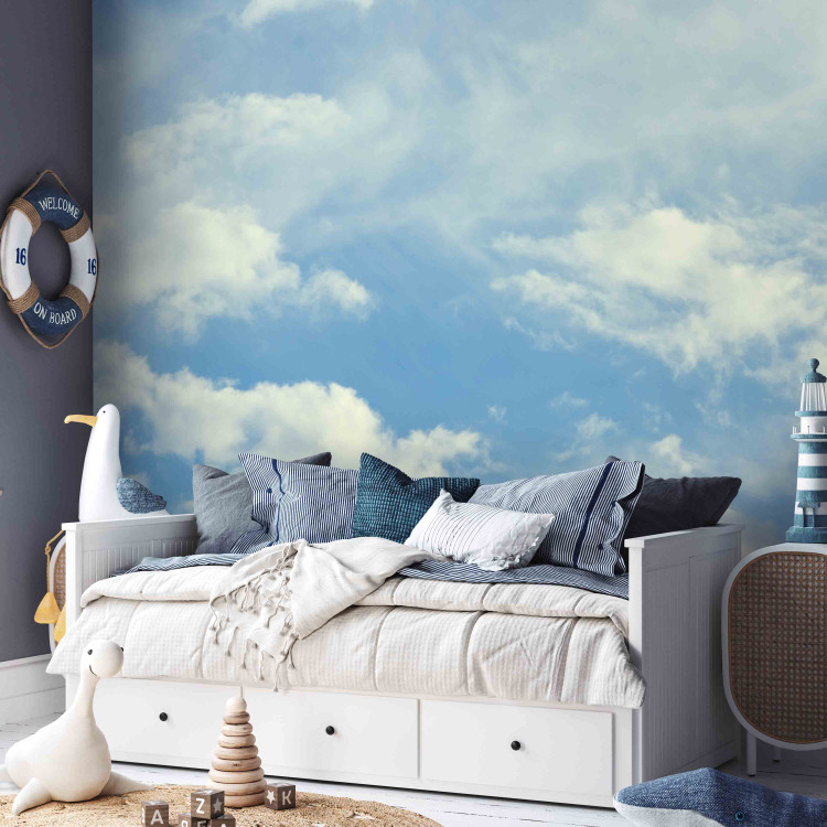 Fototapet Huvudet bland molnen - landskapets blå färg med vita moln 59854 additionalImage 4