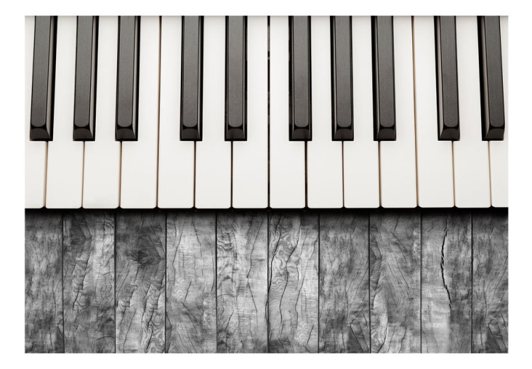 Fototapet Inspirerad av klassisk musik - konstnärligt pianoklaviatur på en grå träbakgrund 61376 additionalImage 1