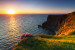 Fototapet Moherklipporna Irland - havslandskap med klippor vid solnedgången 60496