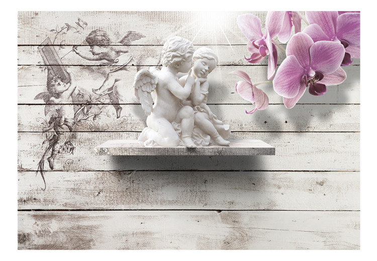 Fototapet Kärlekens kyss - staty av änglar på grått trä med en orkidé 62296 additionalImage 1